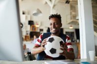 Fan with soccer ball