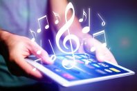 Concept of listenning music on a device - Technology concept