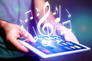 Concept of listenning music on a device - Technology concept