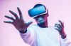 African american man in vr glasses, playing video games with virtual reality headset, trying to touch something with hand