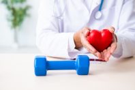 Young male doctor in sport and dieting concept