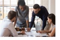 Focused multiracial corporate business team people brainstorm on