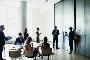 Business people brainstorming in conference room meeting