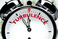 Turbulence soon, almost there, in short time - a clock symbolize