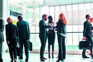 Business people in business center lobby