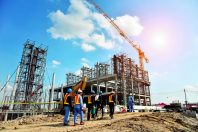 Construction Site with Cranes and construction worker
