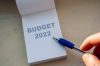 Budget 2022 word on white paper note and pen. Financial concept