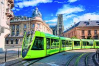 Modern tram on the streets of the old town of Reims, France