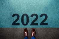 2022 Year Concept. Top View of Businessman Standing on Starting