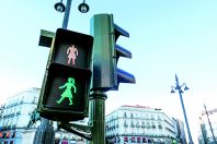 Female traffic pedestrian green light in Madrid city