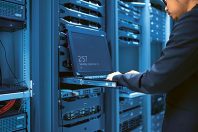 Man fix server network in data center room