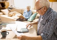 Senior Man Filling Forms