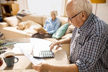 Senior Man Filling Forms