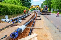 Travaux de voirie pour le chauffage urbain. Extension d'un réseau de chaleur. Pose de canalisations enterrées