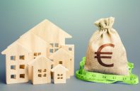 Residential houses and a euro money bag. Property real estate valuation. Buying and selling, fair price. City municipal budget. Calculation of expenses, construction and repair. Mortgage loan