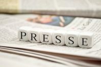 Presse mit Zeitungen