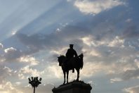 Horse statue in sun shade