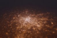 Aerial shot of Lyon (France) at night, view from south. Imitation of satellite view on modern city with street lights and glow effect. 3d render