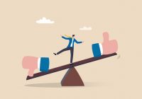 Demerit and merit evaluation, advantage and disadvantage in comparison, performance assessment, manager evaluation, judgment concept, businessman balance on seesaw with thumb up and thumb down.