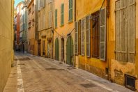 Old Narrow street and apartment buildings in Toulon, Riviera, Co