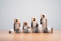 2025 Year on the top of coins stacking for financial plan in new year include budget tax investment saving concept.