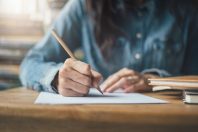 high school,university student study.hands holding pencil writin
