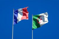 Beautiful national state flags of France and Algeria background.
