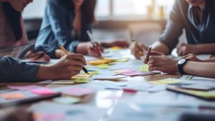 Business people brainstorming. People use stickers to save their ideas. Business project planning. The concept of brainstorming in a startup in a team.