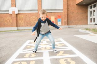 Play Time at school playground a boy have fun playing