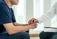 Asia man smiling after consult Psychiatrist ,mental health probl