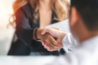 Businesswoman handshake and business people. Successful business