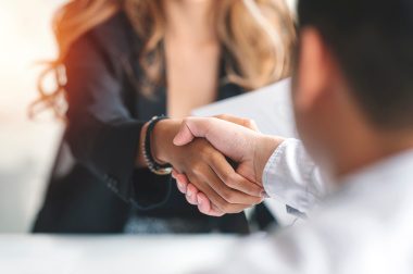 Businesswoman handshake and business people. Successful business