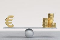 3D rendered Silver color Euro and gold coins standing on a balanced surface. Financial balance concept. Large copy space with light background.