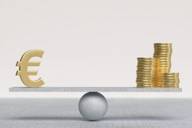 3D rendered Silver color Euro and gold coins standing on a balanced surface. Financial balance concept. Large copy space with light background.